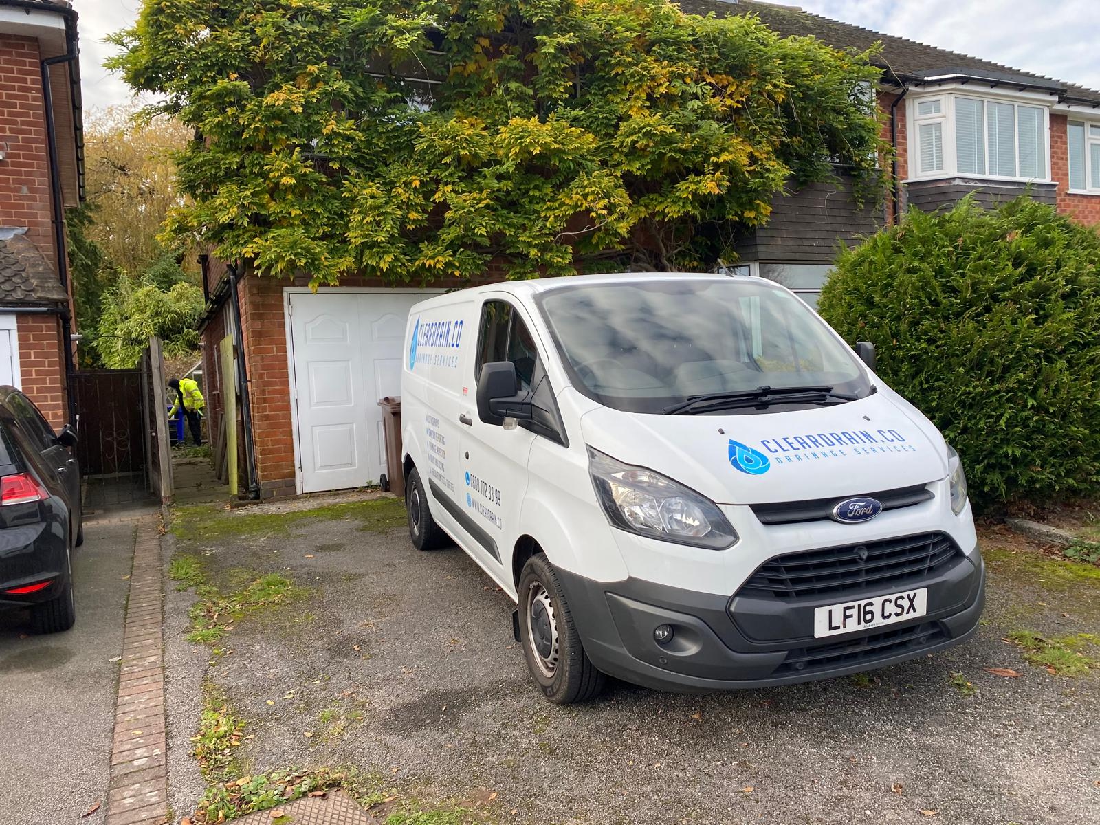 A Clear Drain van on a residential driveway before a drain survey
