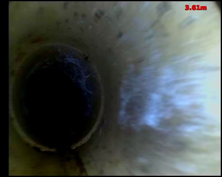 CCTV camera view inside a drain looking towards a pipe joint, with the chainage distance shown in the corner of the frame