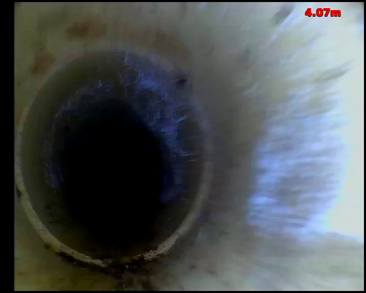 CCTV view along a sound clay drain, the bore clear and the walls unobstructed